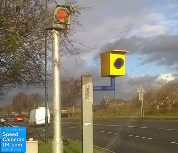 Truvelo camera with separate infra-red flash mounted on pole beside Truvelo speed camera